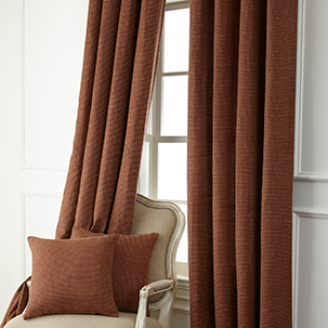 go to drapes and decorative pillow cases rust